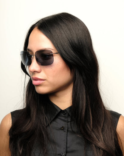 https://cdn.shopify.com/s/files/1/0818/5459/5398/files/giorgio-armani-giorgio-armani-fall-2000-sunglasses-vintage-su484-7252832.jpg?v=1778953722