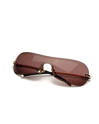 https://cdn.shopify.com/s/files/1/0818/5459/5398/files/giorgio-armani-giorgio-armani-spring-2001-shield-vintage-su468-3307878.jpg?v=1778953753