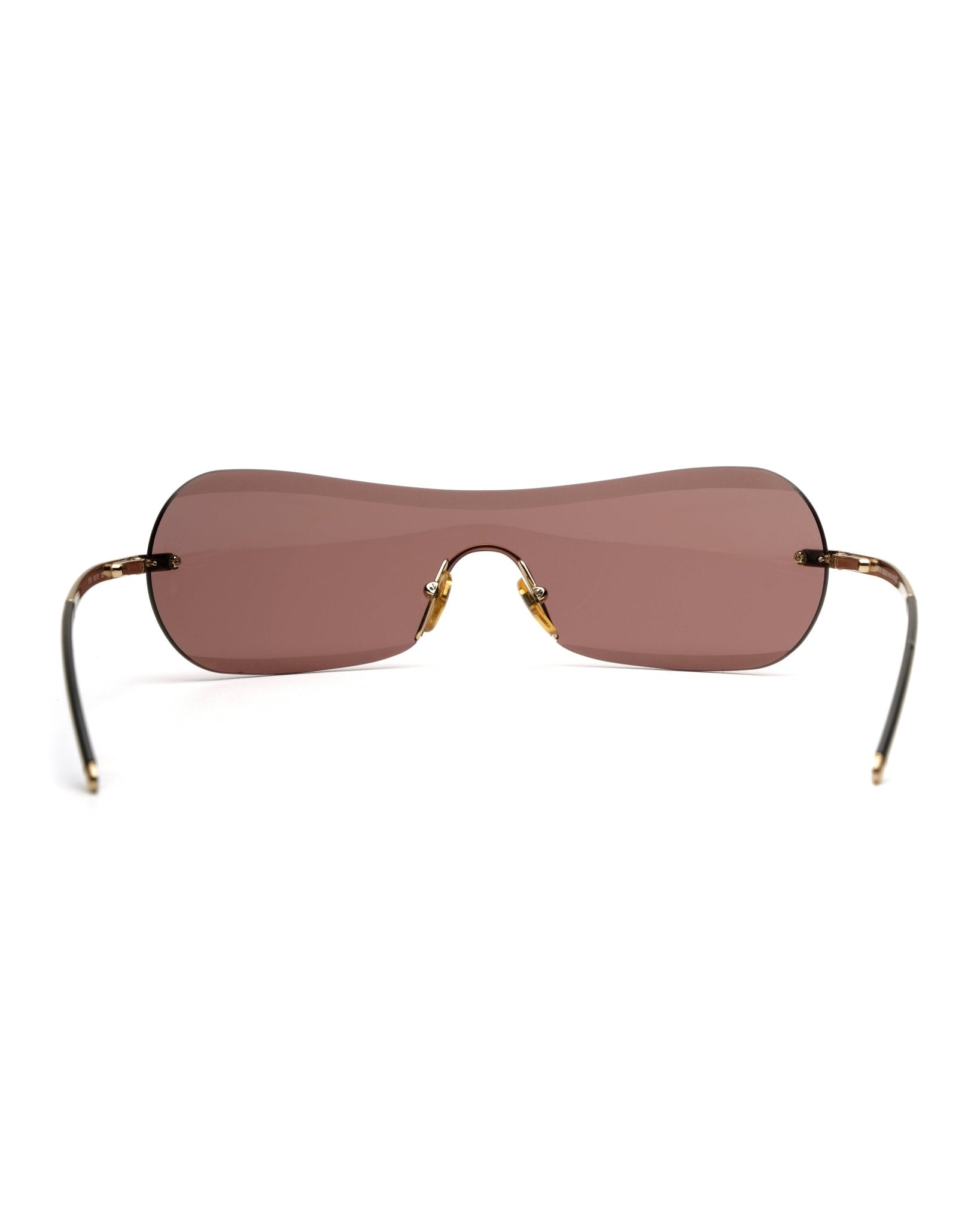 https://cdn.shopify.com/s/files/1/0818/5459/5398/files/giorgio-armani-giorgio-armani-spring-2001-shield-vintage-su468-9909573.jpg?v=1778953753