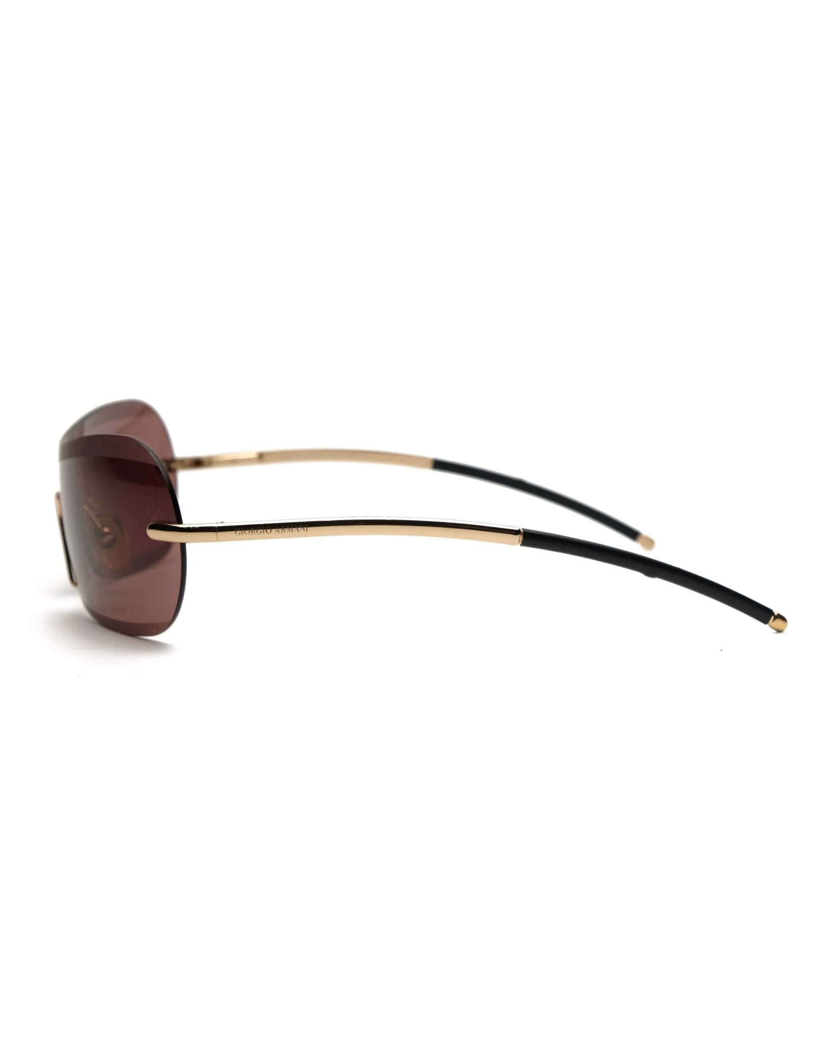 https://cdn.shopify.com/s/files/1/0818/5459/5398/files/giorgio-armani-giorgio-armani-spring-2001-shield-vintage-su468-9929121.jpg?v=1778953753