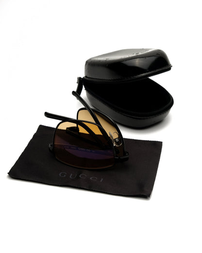 https://cdn.shopify.com/s/files/1/0818/5459/5398/files/gucci-gucci-foldable-sunglasses-vintage-su474-6328256.jpg?v=1778953744