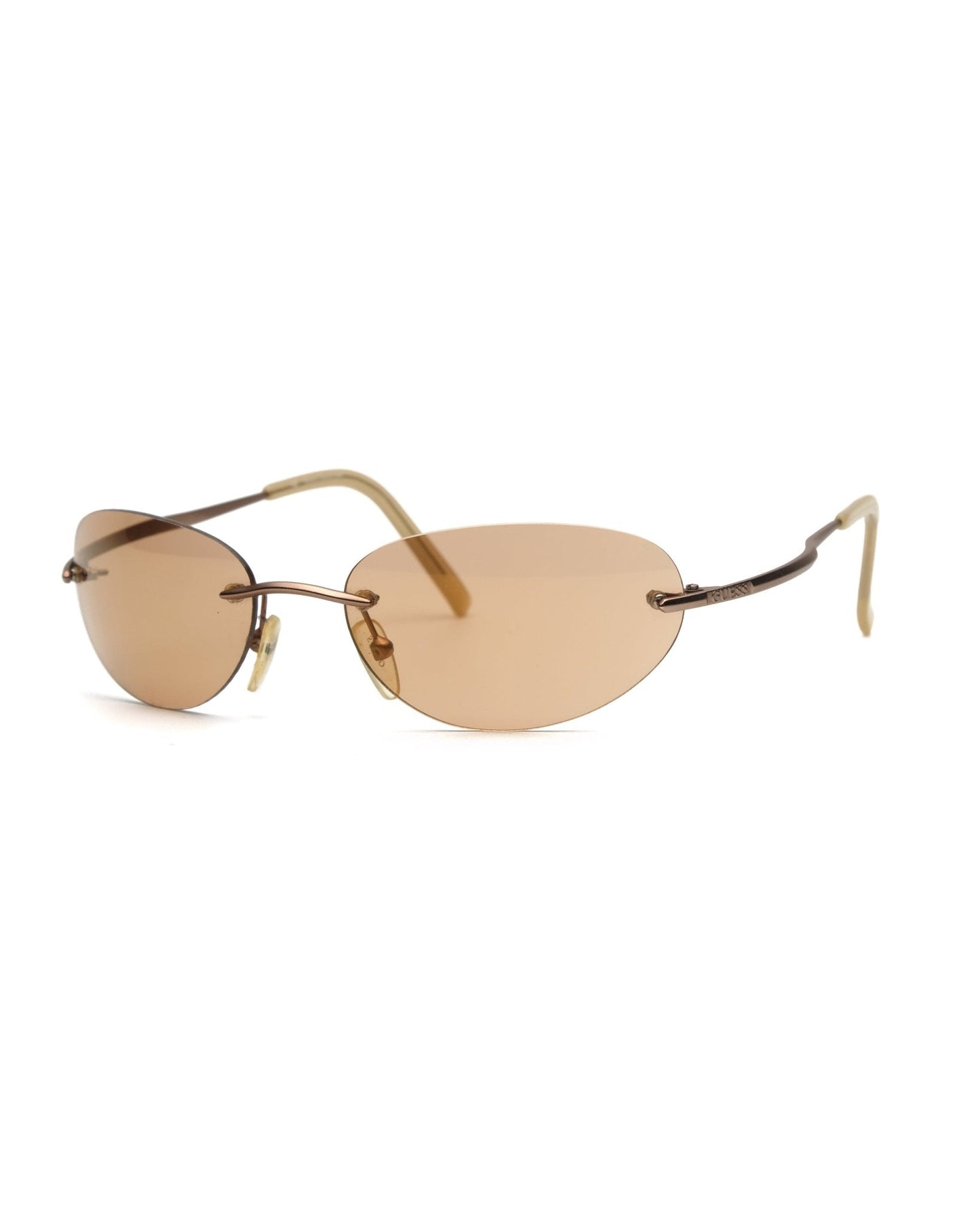 https://cdn.shopify.com/s/files/1/0818/5459/5398/files/guess-guess-rimless-sunglasses-vintage-su357-7107314.jpg?v=1766681208
