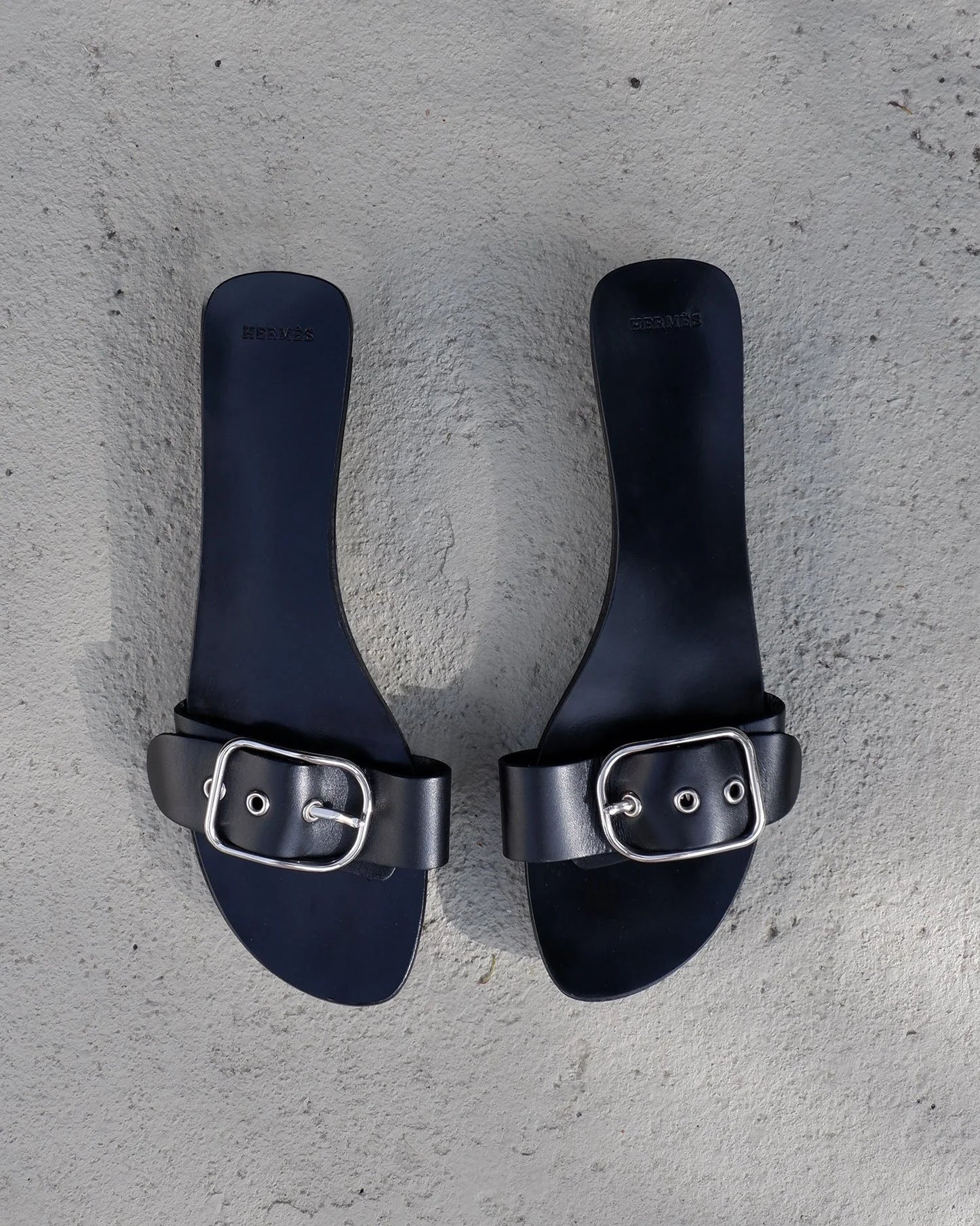 https://images.squarespace-cdn.com/content/v1/5b579b7b70e8025a5b246025/d4ad7274-527c-4df7-a10a-d896f6ac51a3/hermessandals0.jpg