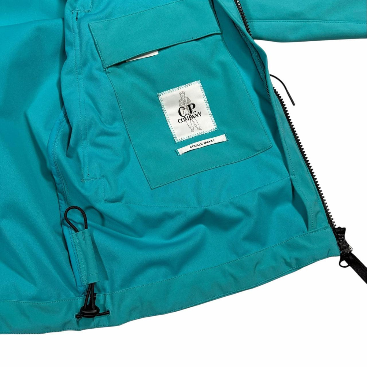 CP Company Multi-pocket soft shell goggle Jacket (S) | Small, Turquoise
