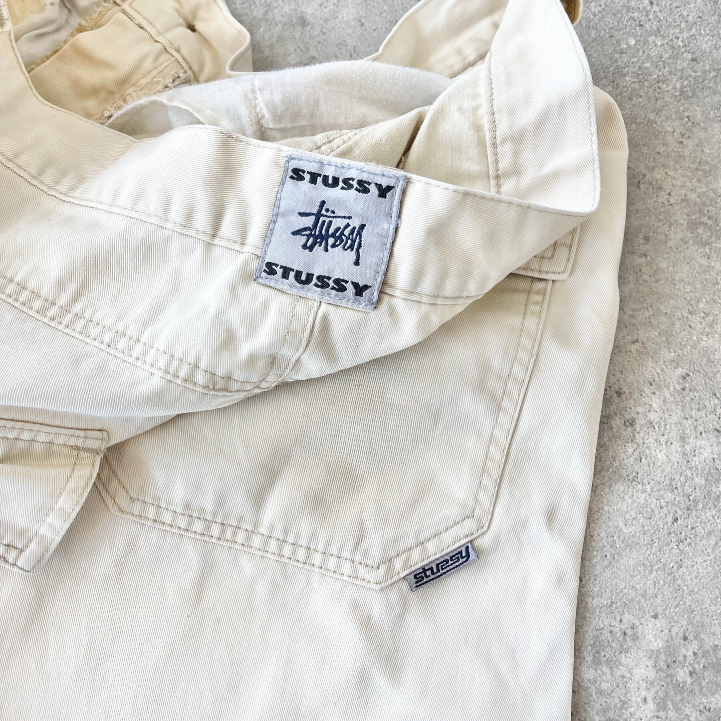 Stussy 2000s script spellout cream jorts (36”)