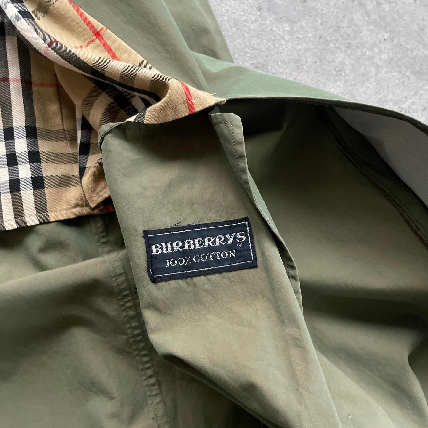 Burberry’s 1990s nova check iridescent trench jacket (S)