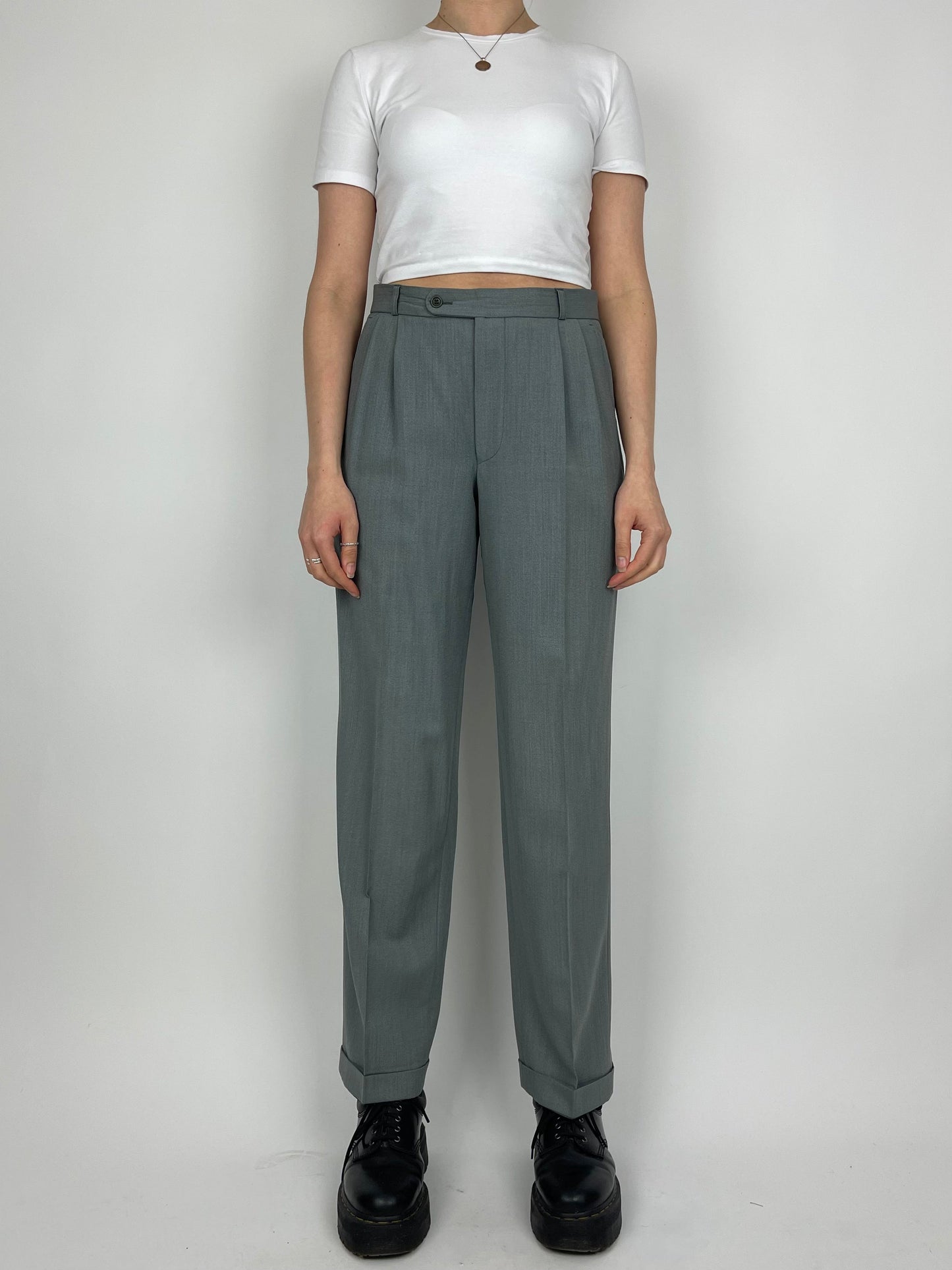 Vintage wool jumpsuit featuring a classic fit, with a tailored collar and long sleeves, displayed on a neutral background.