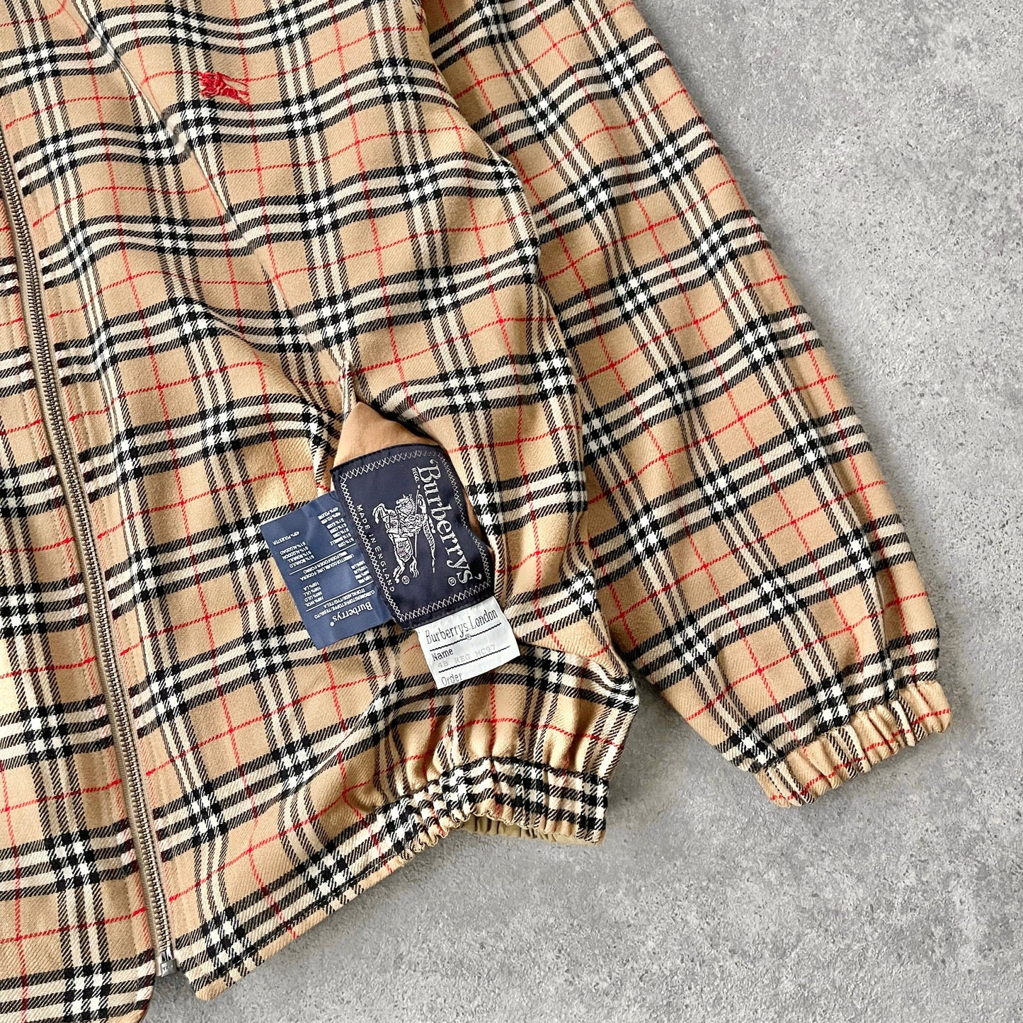 Burberry’s 1990s reversible nova check harrington jacket (M)