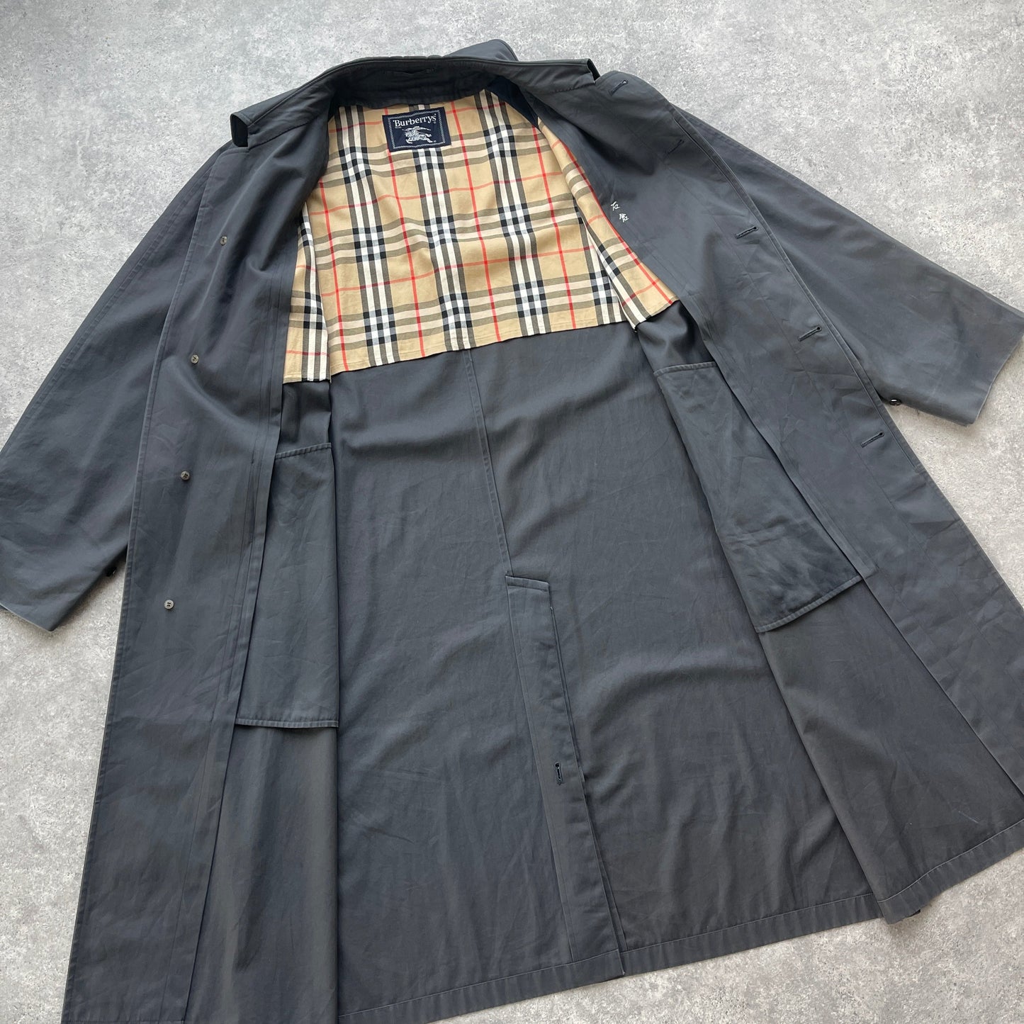 Burberry’s 1990s nova check trench jacket (L)