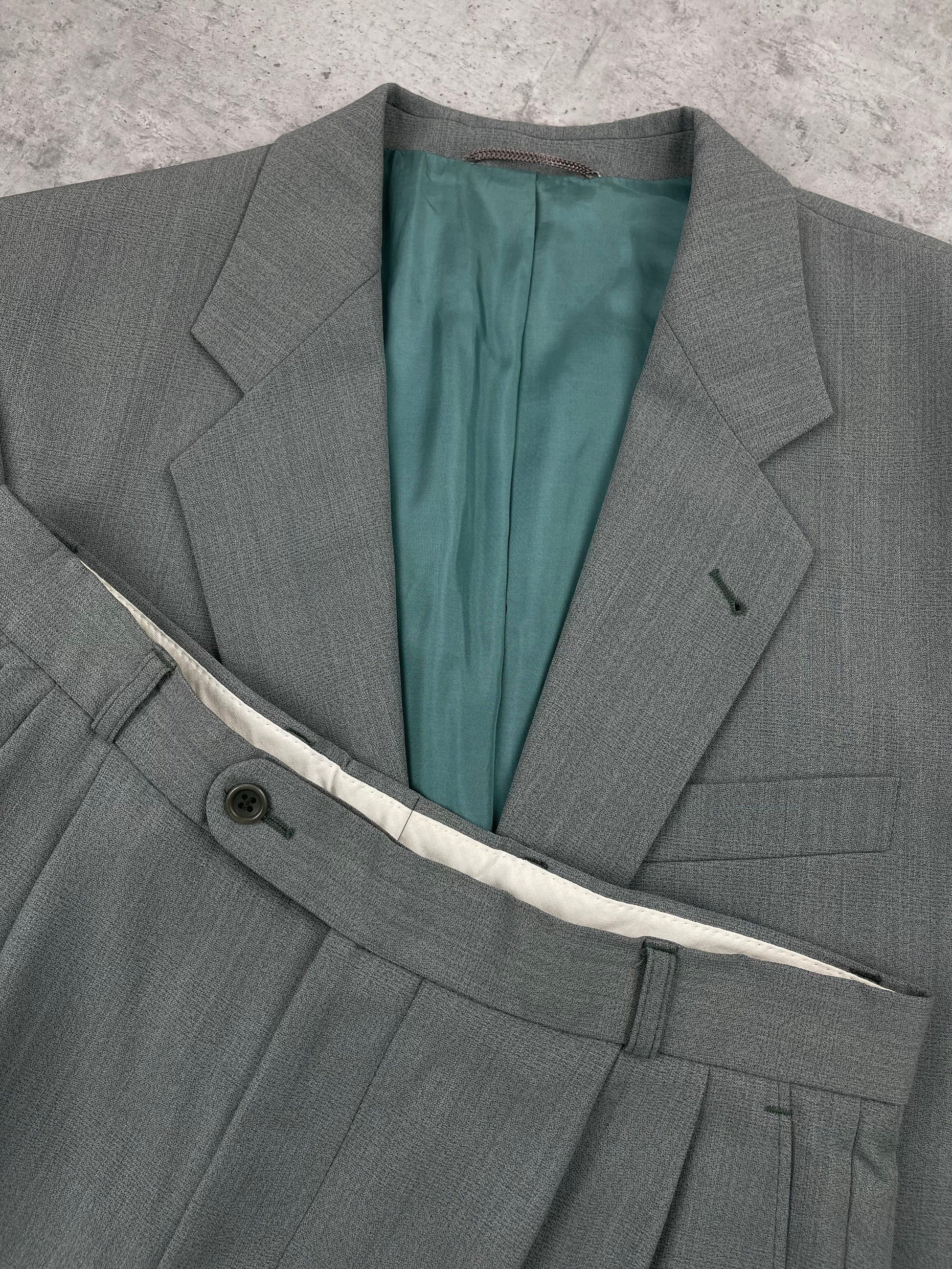 Vintage wool jumpsuit featuring a classic vintage style, tailored fit, and textured fabric for a timeless look.