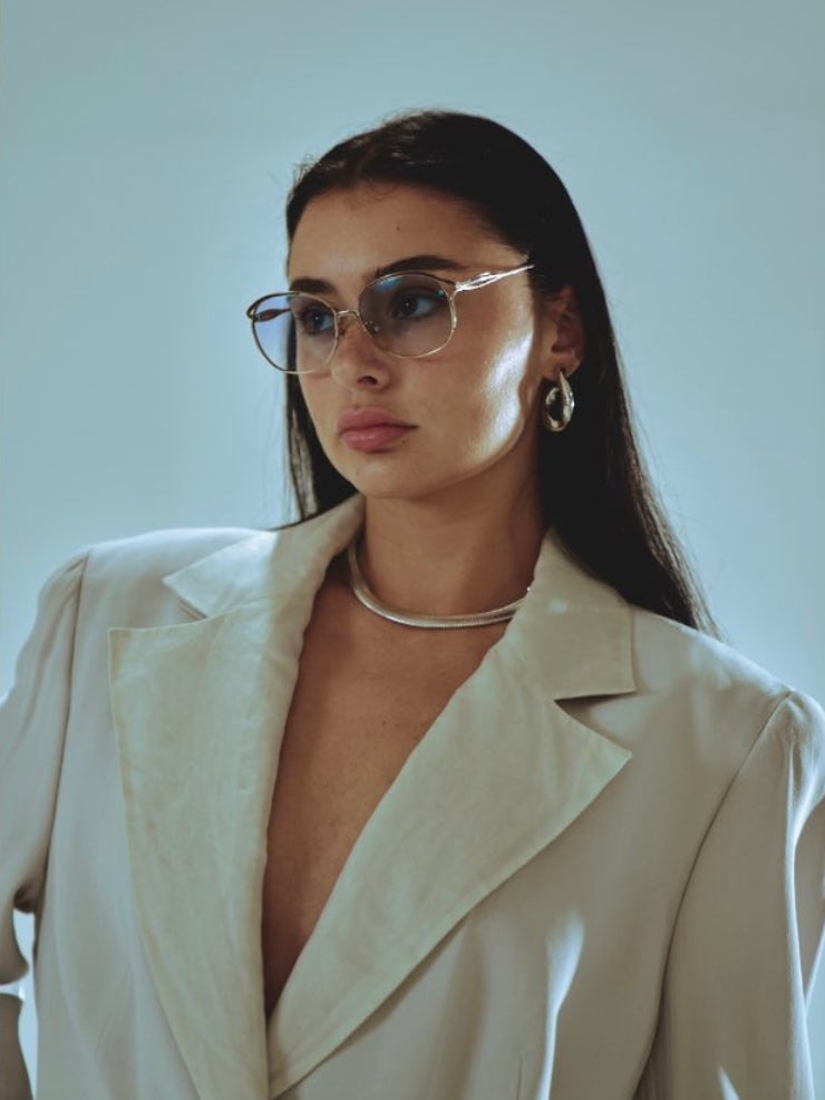 Yves Saint Laurent Paris round sunglasses with black frames and dark lenses, stylish and sophisticated eyewear.