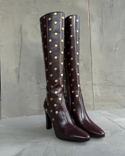 Saint Laurent Studded Leather Heeled Boots – EU 40-on a concrete background