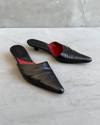 Kenzo Black Leather Kitten Heel Mule – EU 36.5-on a concrete background