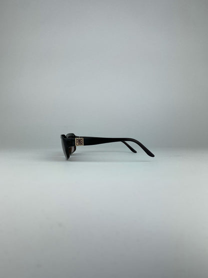 Loewe rectangle sunglasses with brown frames and dark lenses, stylish eyewear for sun protection and fashion.