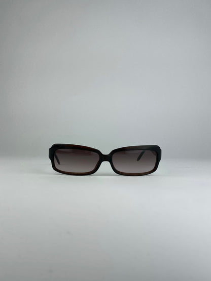 Loewe rectangle sunglasses with brown frames and dark lenses, stylish eyewear for sun protection and fashion.