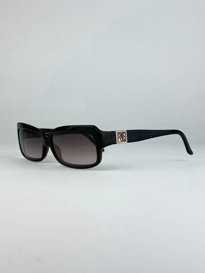 Loewe rectangle sunglasses with brown frames and dark lenses, stylish eyewear accessory for sun protection.
