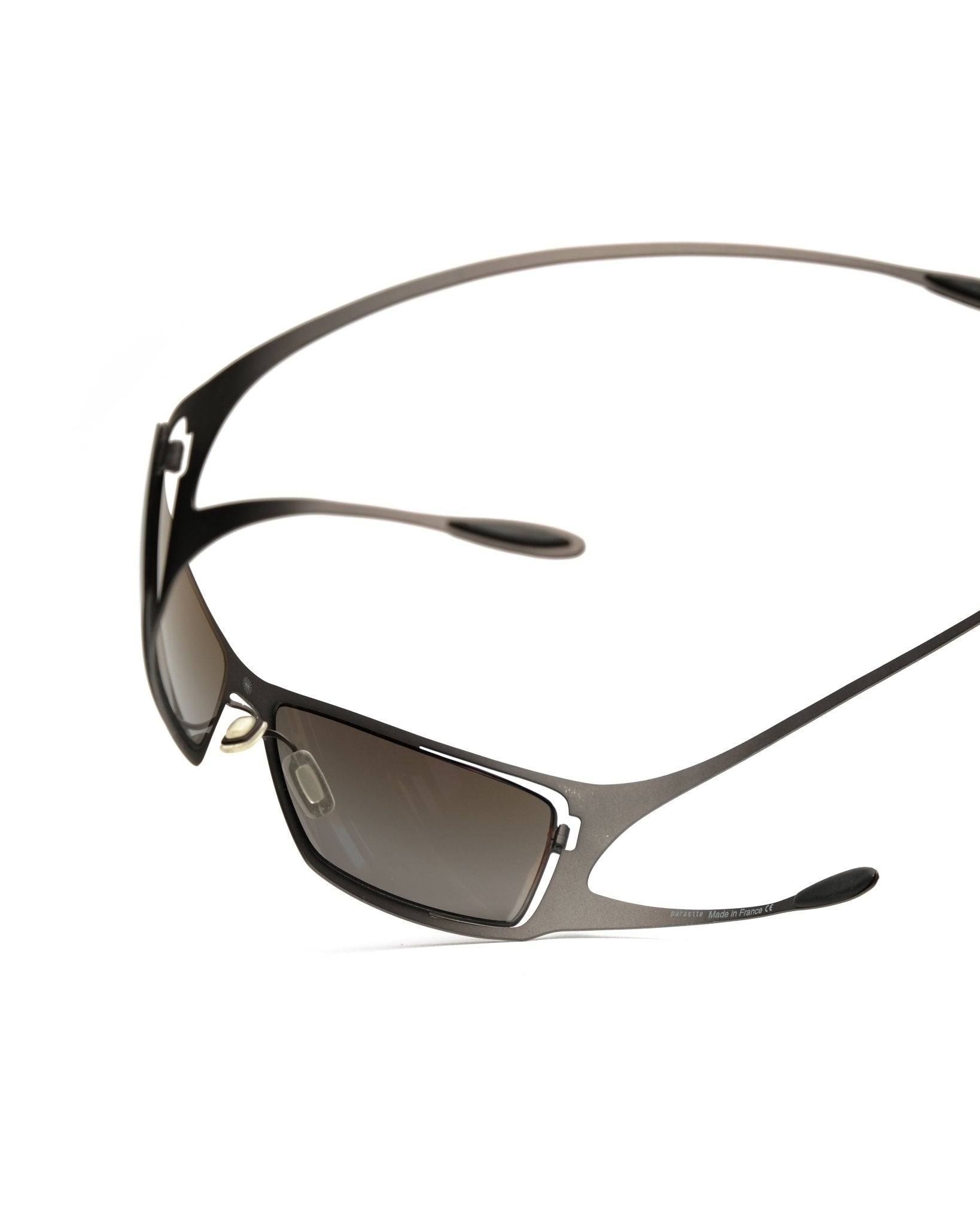 https://cdn.shopify.com/s/files/1/0818/5459/5398/files/parasite-parasite-2005-sunglasses-vintage-su493-4674632.jpg?v=1778953717