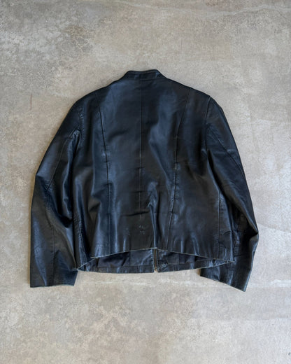 Pallas Cuir Boxy Black Leather Jacket – S/M-on a concrete background