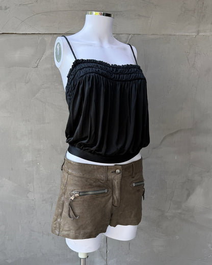 Miu Miu Black Acetate Nylon Blend Top – S-on a concrete background