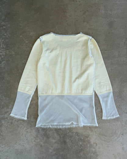 Comme des Garçons AW2012 Wool and Mesh Long Sleeve T-Shirt – M-on a concrete background