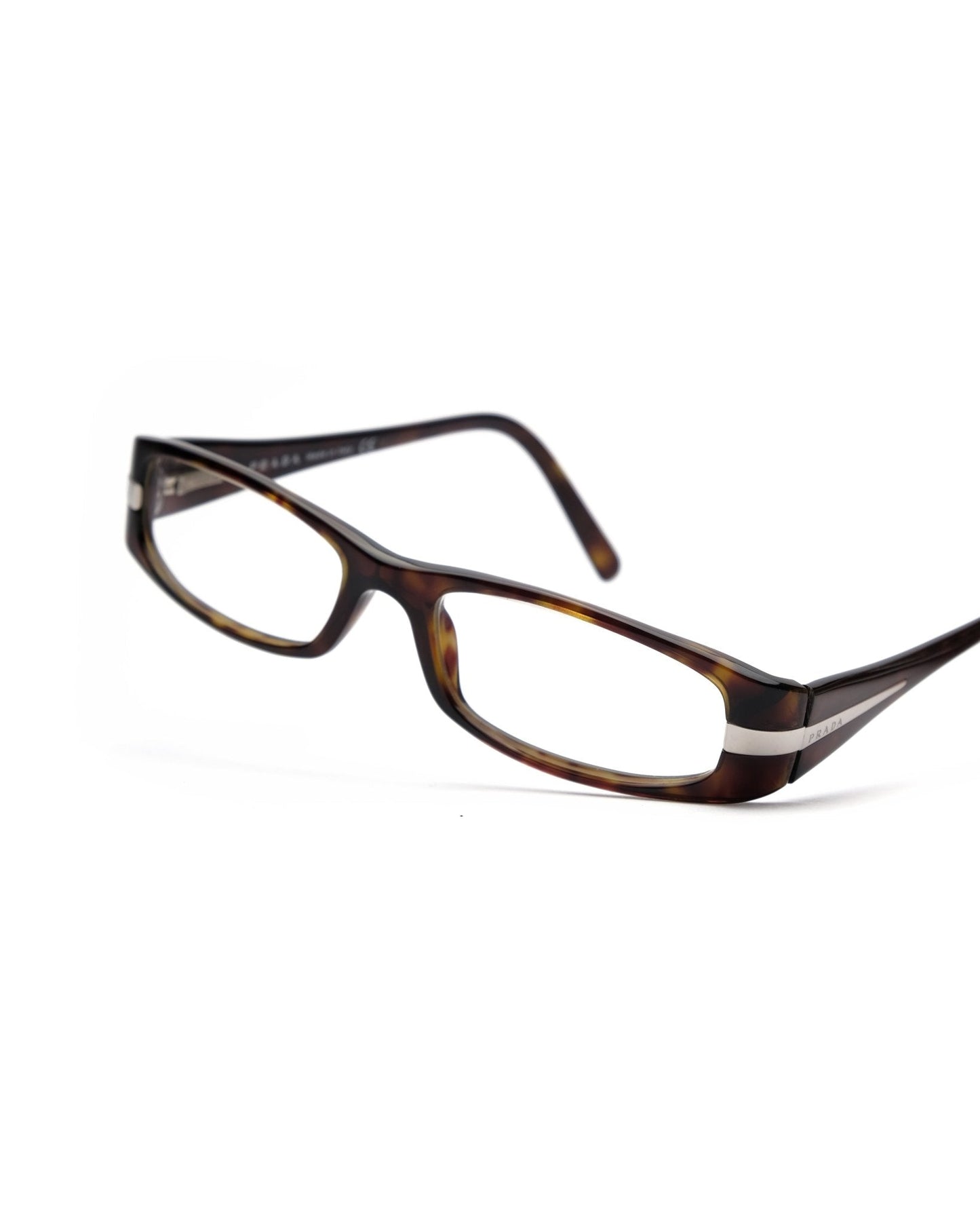 https://cdn.shopify.com/s/files/1/0818/5459/5398/files/prada-prada-fall-2006-optical-frame-vintage-su544-5559821.jpg?v=1784368364