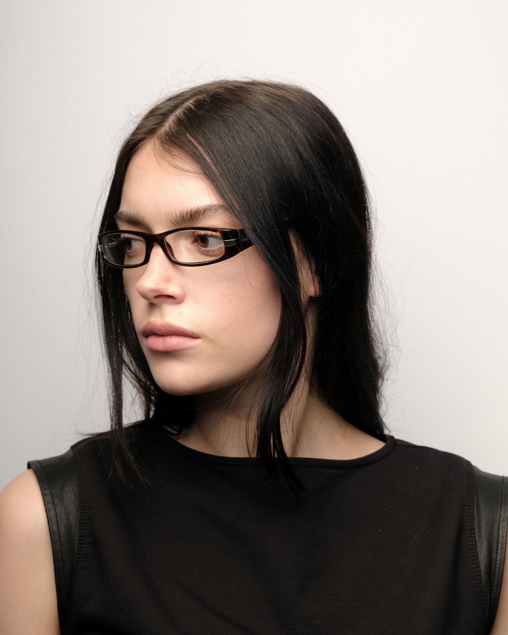 https://cdn.shopify.com/s/files/1/0818/5459/5398/files/prada-prada-fall-2006-optical-frame-vintage-su544-5613986.jpg?v=1784368363