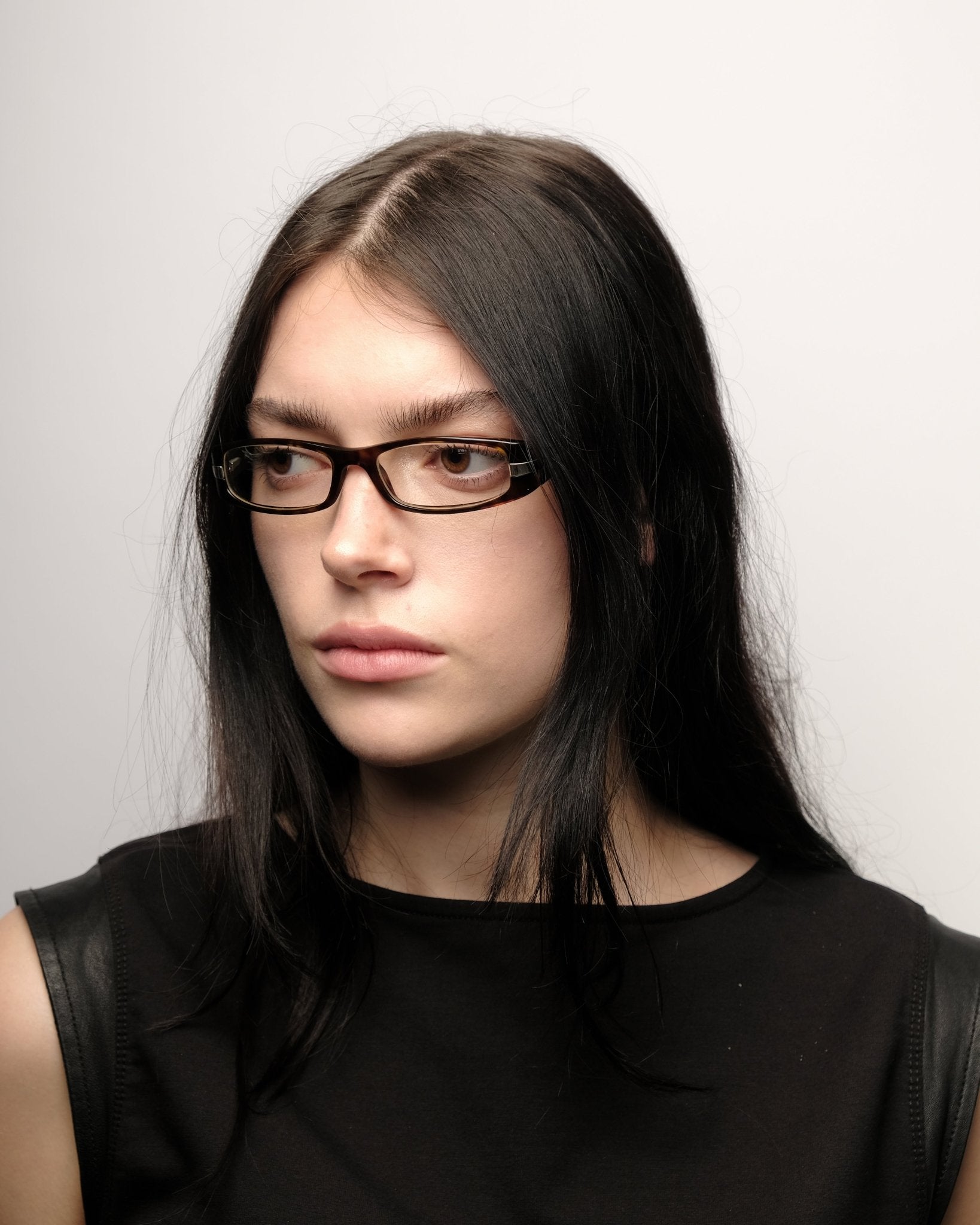 https://cdn.shopify.com/s/files/1/0818/5459/5398/files/prada-prada-fall-2006-optical-frame-vintage-su544-6843063.jpg?v=1784368364