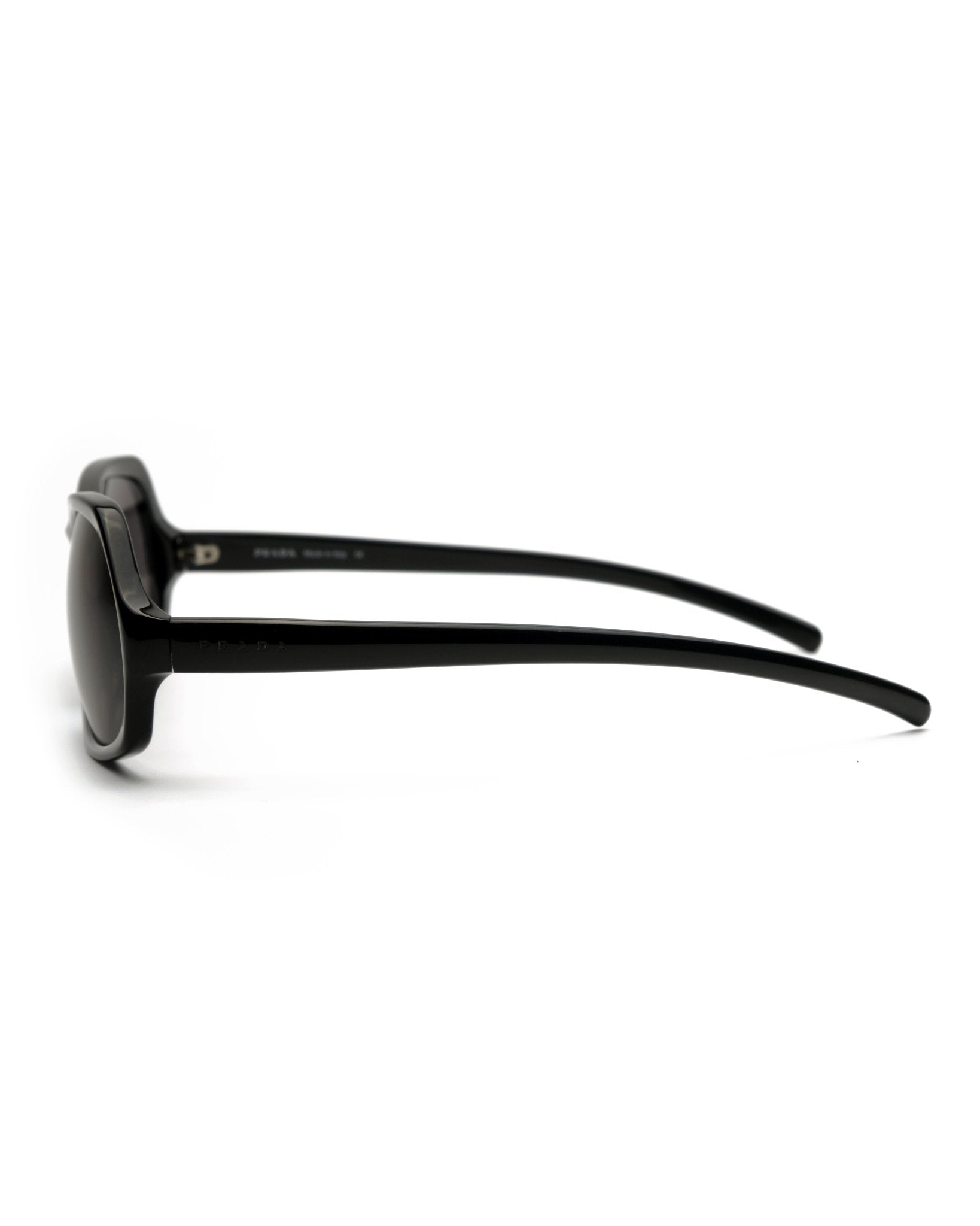 https://cdn.shopify.com/s/files/1/0818/5459/5398/files/prada-prada-spring-2001-sunglasses-vintage-su473-5703524.jpg?v=1778953740