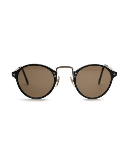 https://cdn.shopify.com/s/files/1/0818/5459/5398/files/romeo-gigli-romeo-gigli-sunglasses-vintage-su487-8010291.jpg?v=1778953711