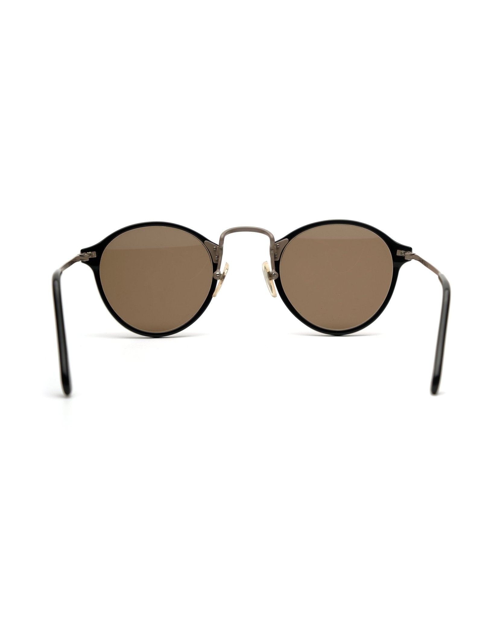 https://cdn.shopify.com/s/files/1/0818/5459/5398/files/romeo-gigli-romeo-gigli-sunglasses-vintage-su487-9572632.jpg?v=1778953713