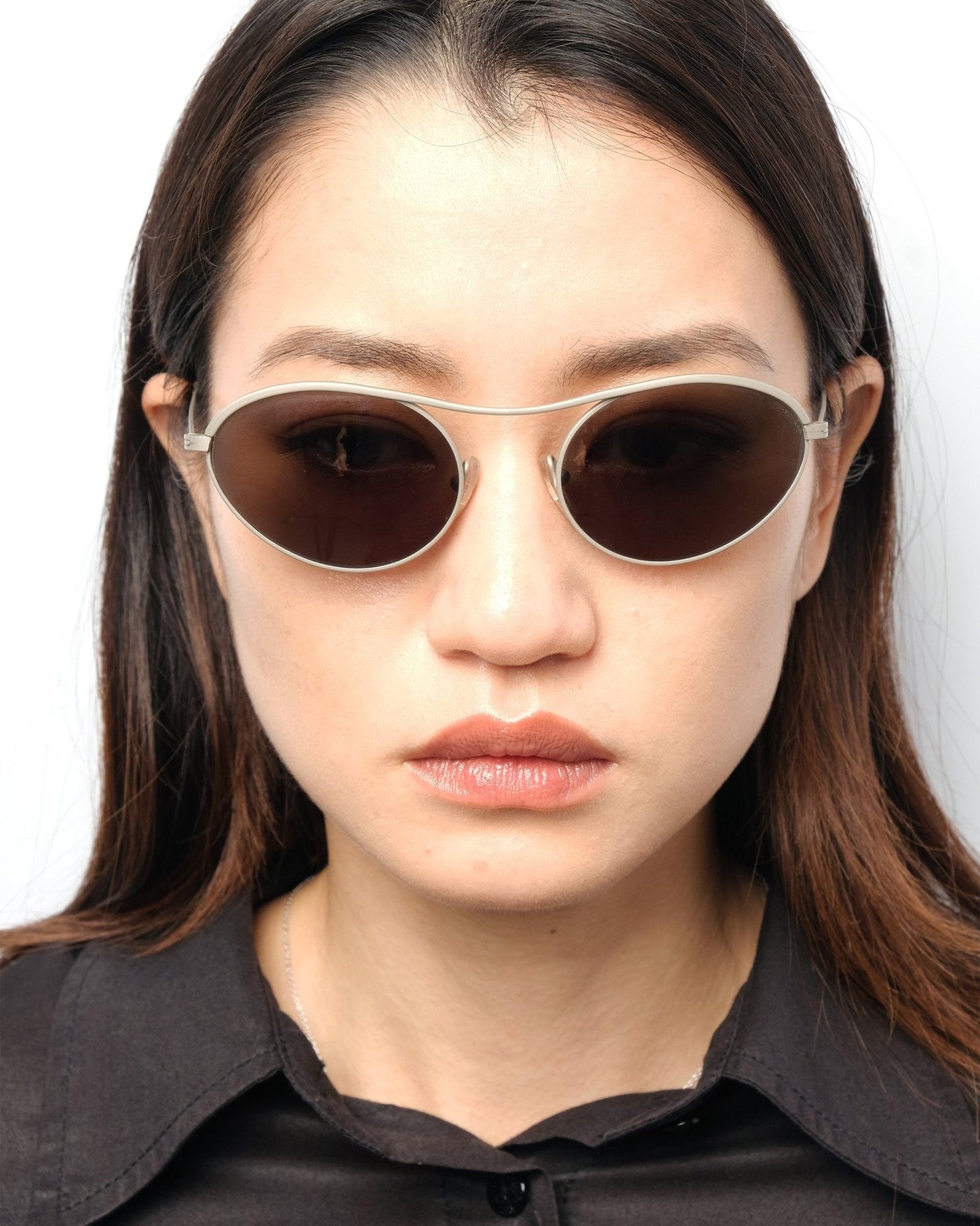 https://cdn.shopify.com/s/files/1/0818/5459/5398/files/runway-fw1994-romeo-gigli-sunglasses-292059.jpg?v=1733870376