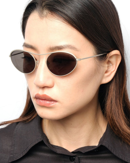 https://cdn.shopify.com/s/files/1/0818/5459/5398/files/runway-fw1994-romeo-gigli-sunglasses-365838.jpg?v=1733870376