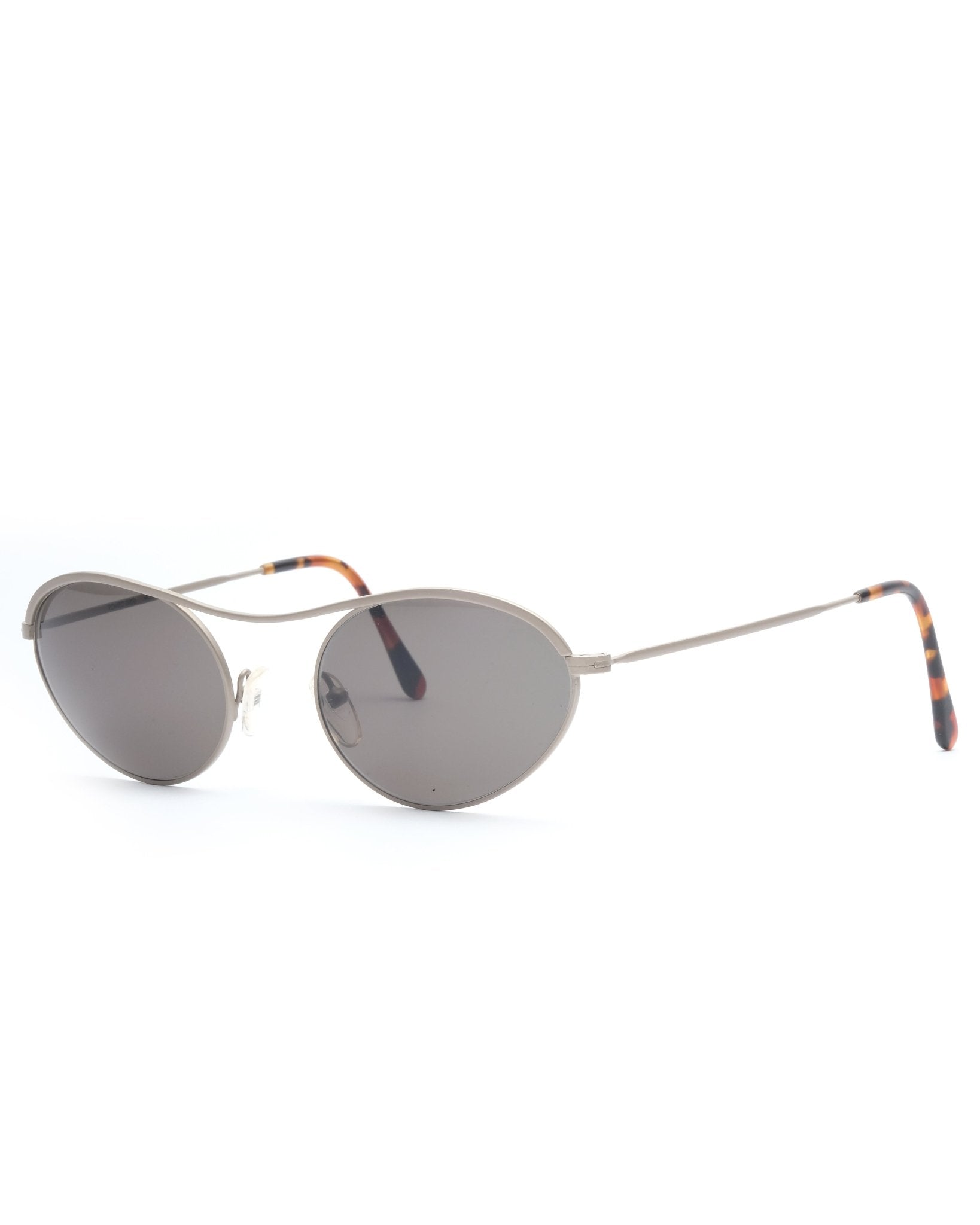 https://cdn.shopify.com/s/files/1/0818/5459/5398/files/runway-fw1994-romeo-gigli-sunglasses-581529.jpg?v=1733870376