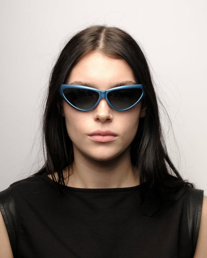 https://cdn.shopify.com/s/files/1/0818/5459/5398/files/spy-spy-wraparound-sunglasses-vintage-su543-1064076.jpg?v=1784368350