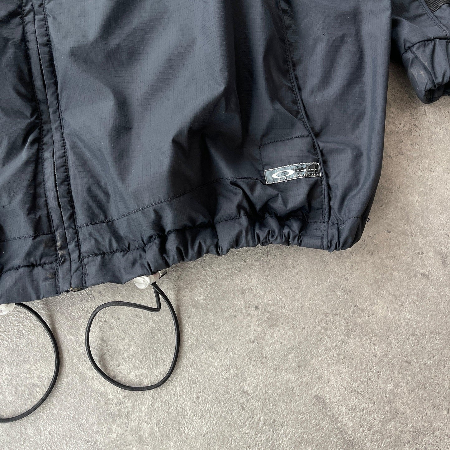 Oakley 2000s technical lightweight spellout jacket (L) - Known Source