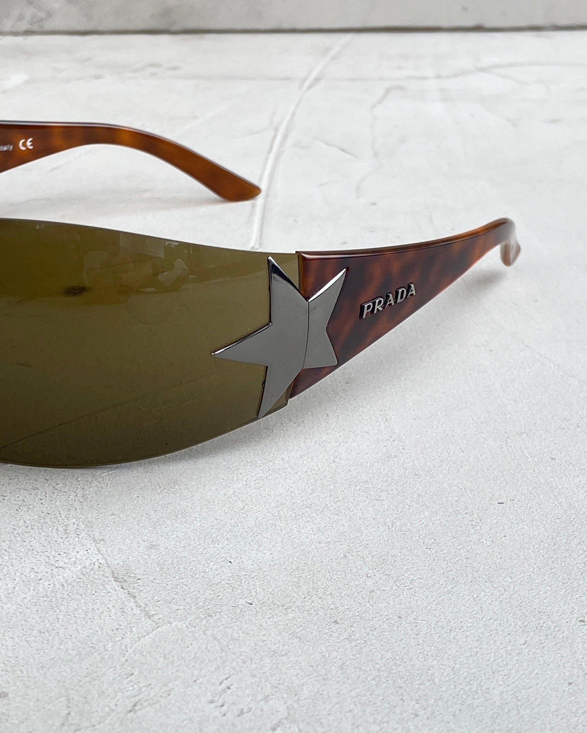 PRADA 2000'S WRAP AROUND STAR SUNGLASSES - Known Source