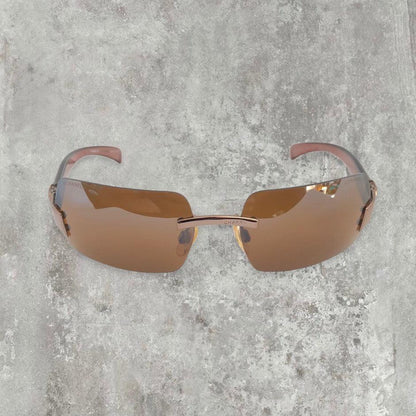 Chanel Rimless Sunglasses with Brown Lens and CC logo - Known Source