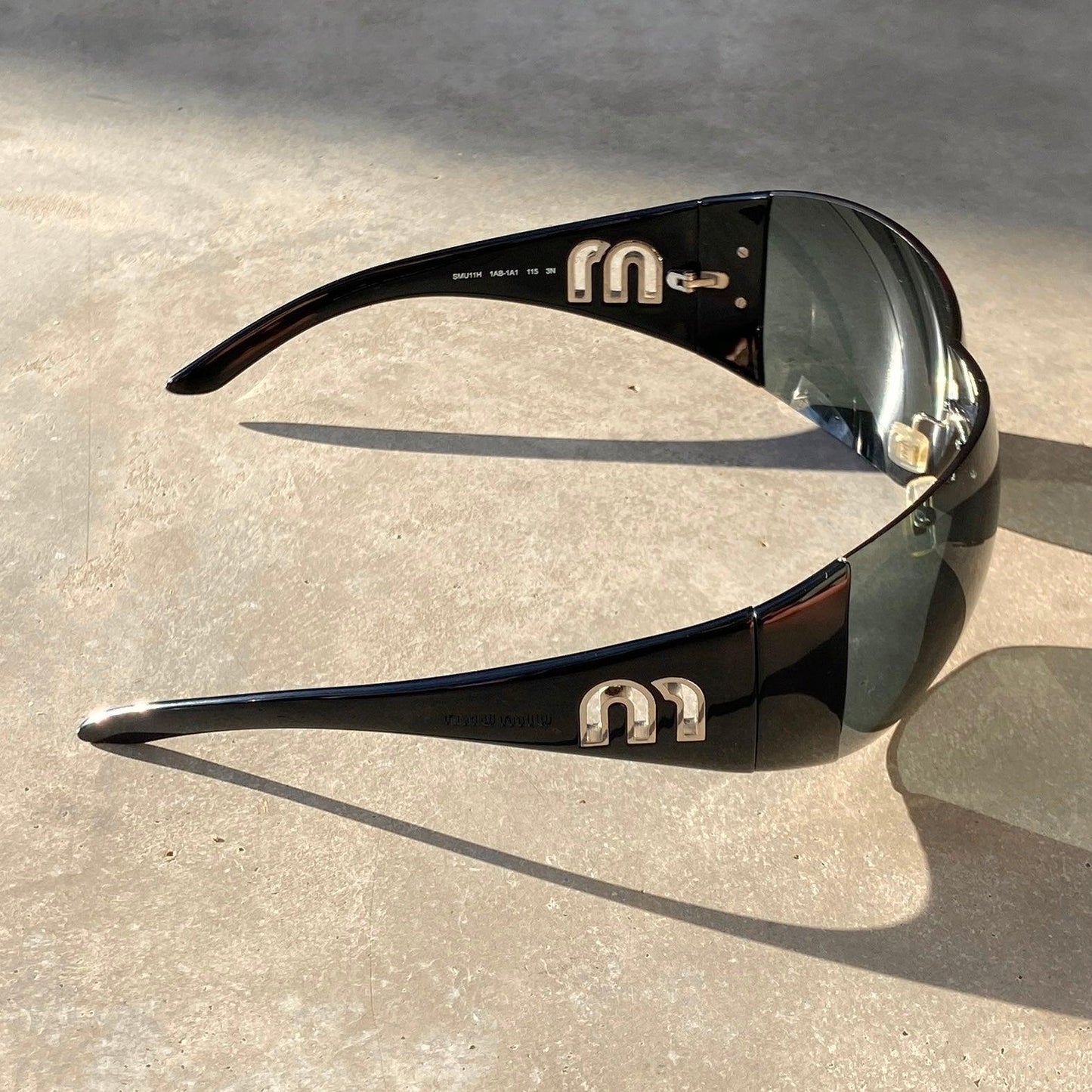 MIU MIU SPORT WRAP SUNGLASSES - Known Source