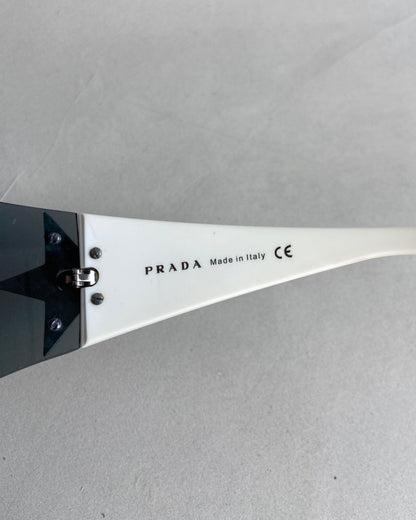 PRADA WRAP AROUND STAR SUNGLASSES - Known Source