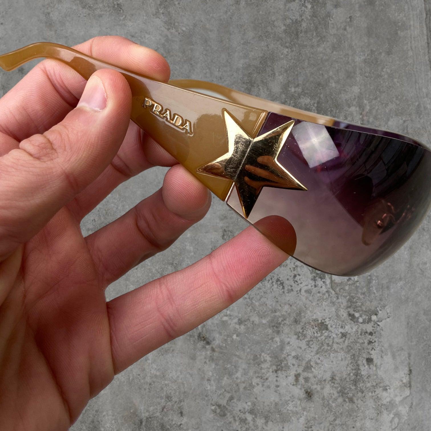 PRADA WRAP AROUND STAR SUNGLASSES - Known Source