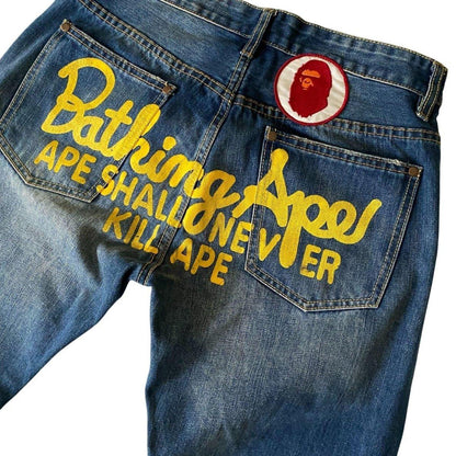 A BATHING APE RELAXED FIT SCRIPT JEAN - Known Source