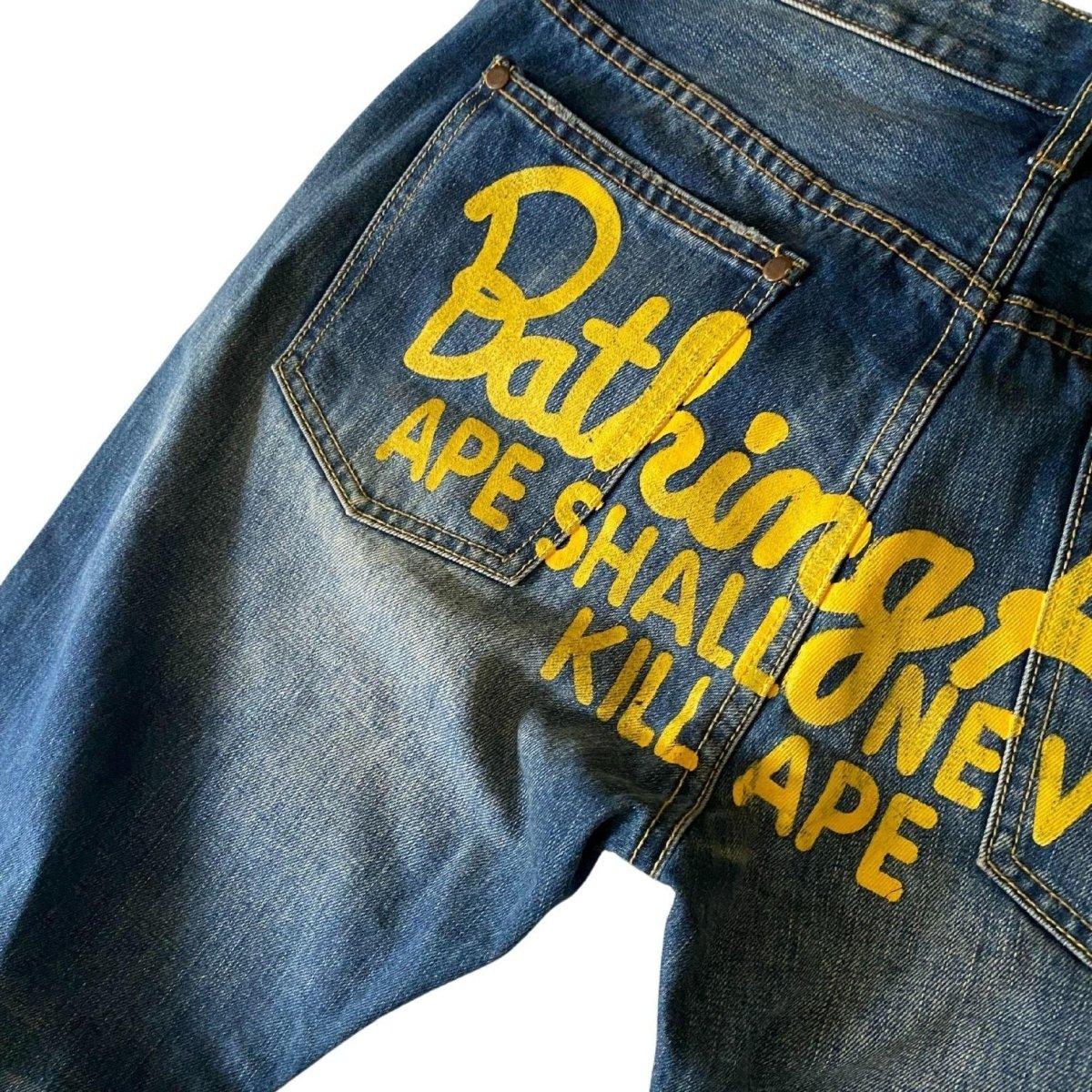 A BATHING APE RELAXED FIT SCRIPT JEAN - Known Source