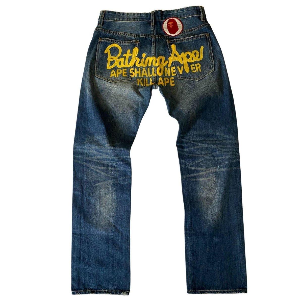A BATHING APE RELAXED FIT SCRIPT JEAN - Known Source