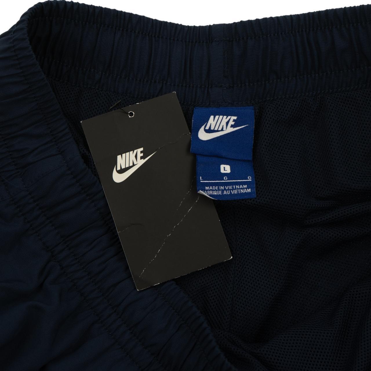 Nike track pants sizing online