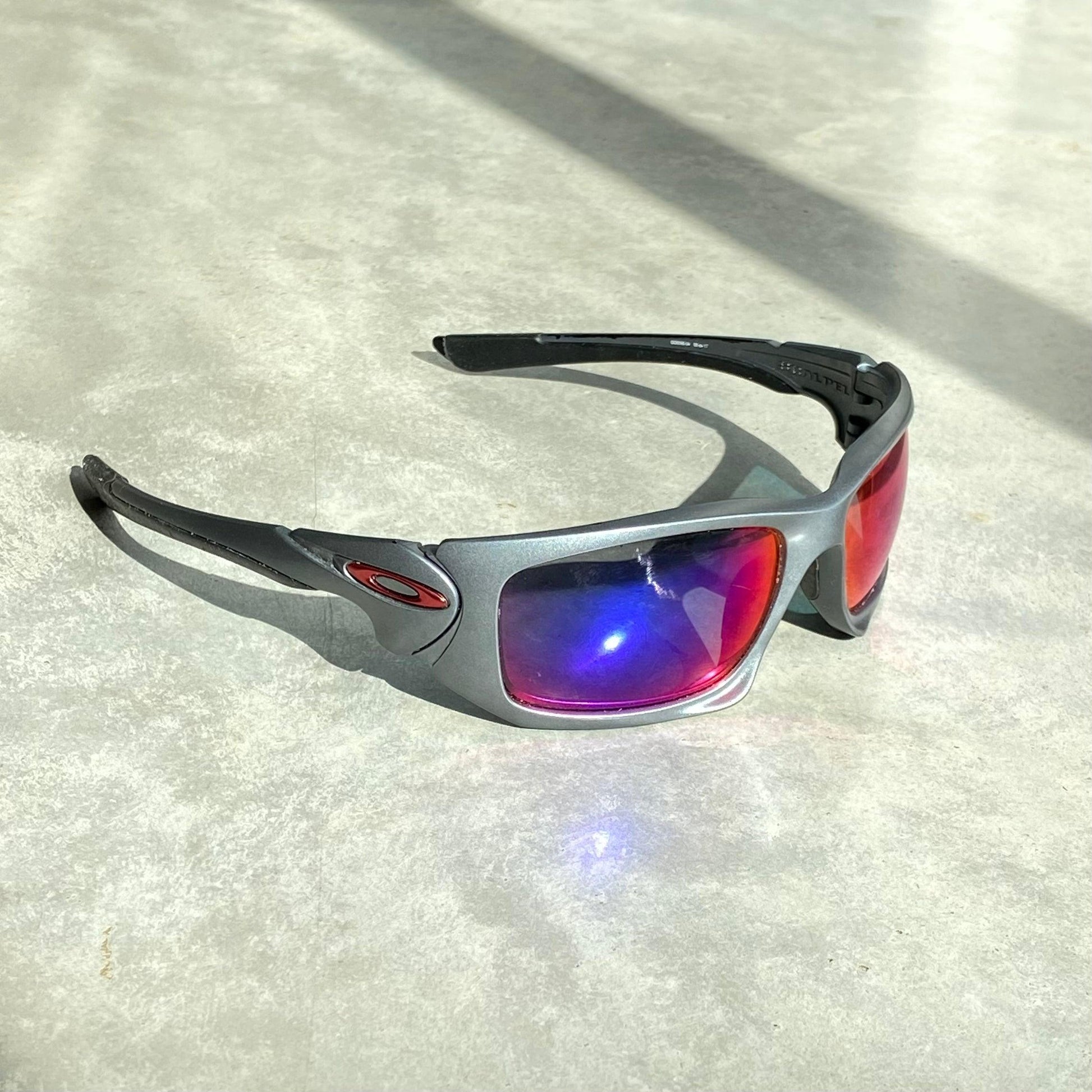 OAKLEY PURPLE POLARISED SUNGLASSES - Known Source