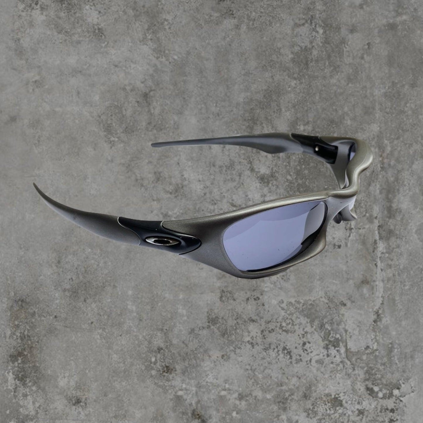 OAKLEY GRAPHITE GREY SUNGLASSES - Known Source