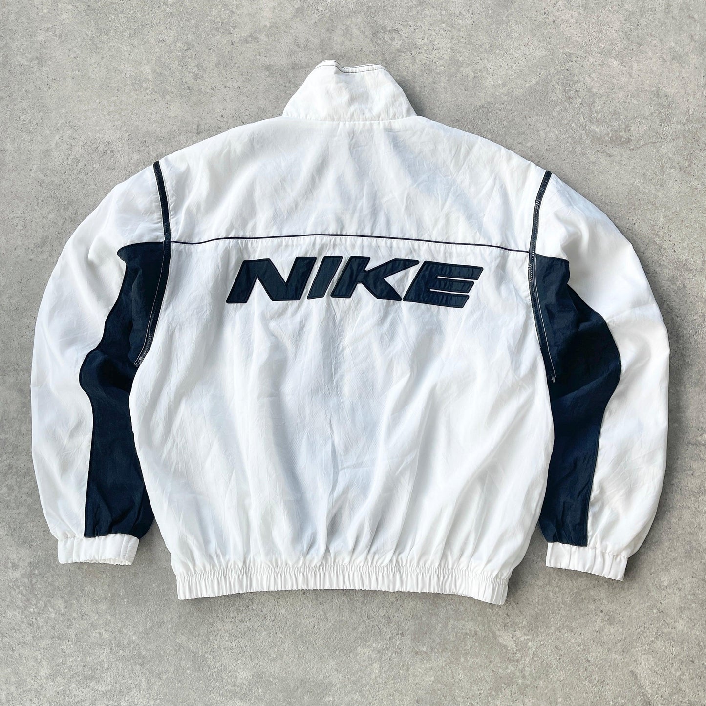 Nike 1990s lightweight convertible spellout shell jacket (S) - Known Source