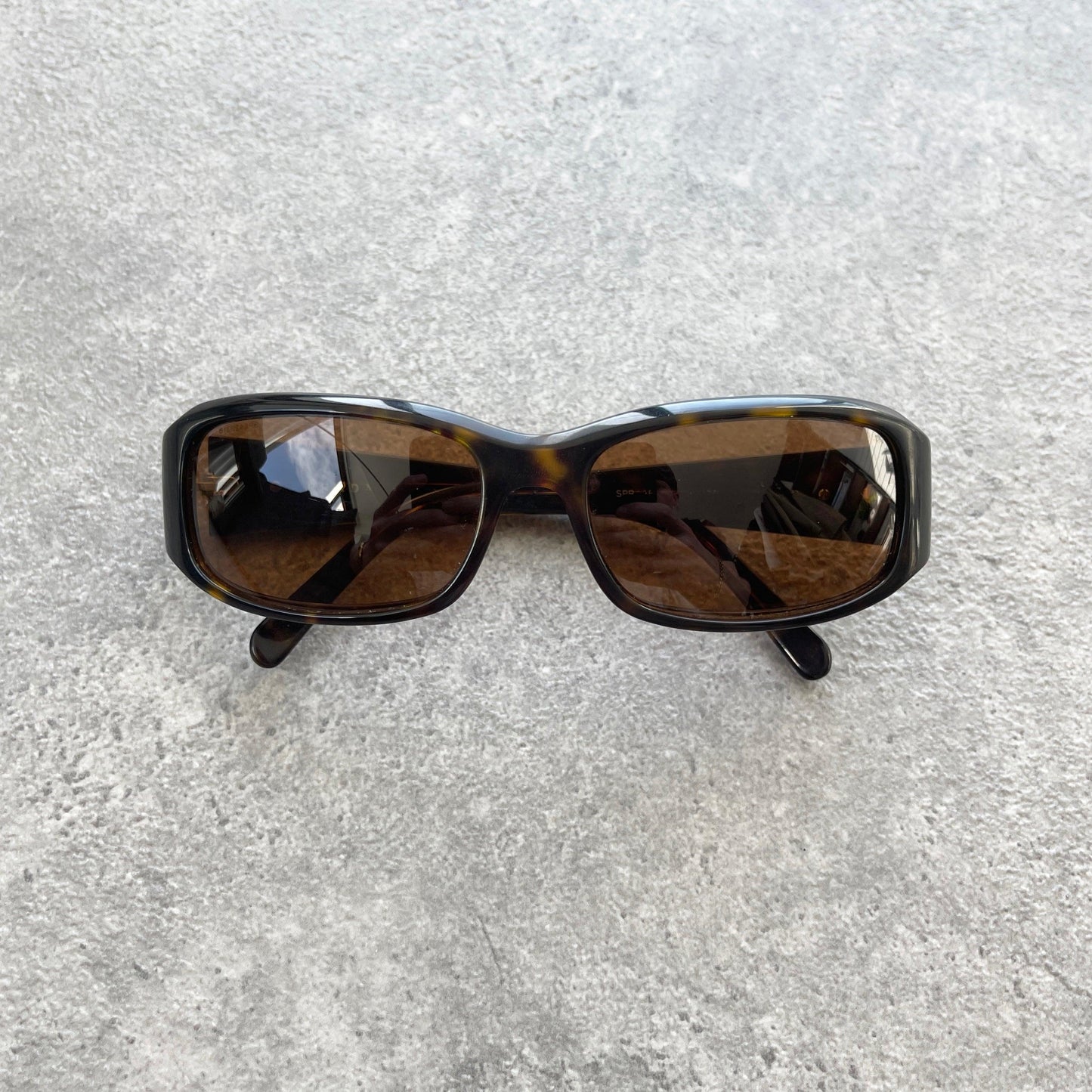 Prada 2000’s tortoise shell wrap around sunglasses - Known Source